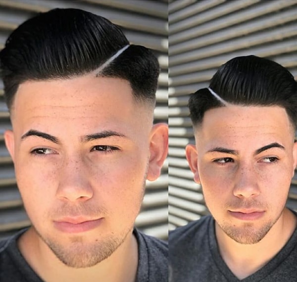 Neat Hard Parted Hairstyle With Low Fade