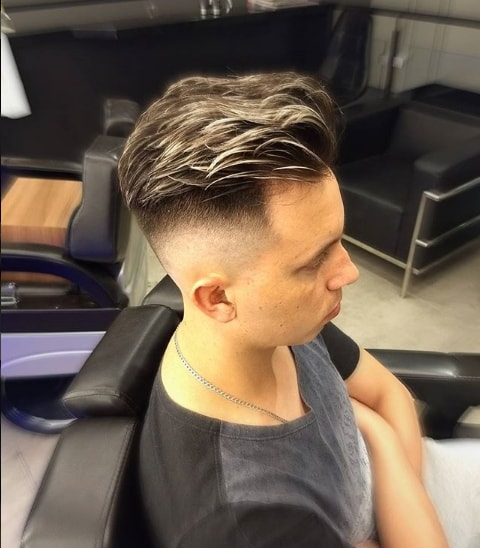 Comb Over & Textured layered Hairstyle With Low Fade