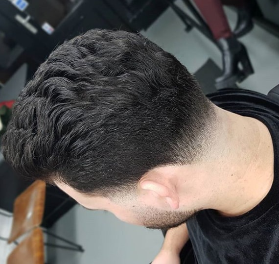 Brushed Back Medium Curl Hairstyle