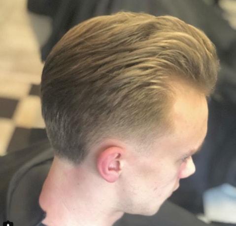Faded Undercut With Combed Back Hair